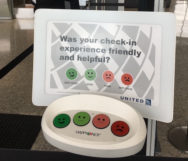 Photo of satisfaction buttons after check-in